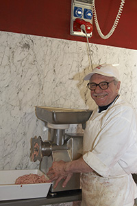 An Italian sausage maker making English bangers