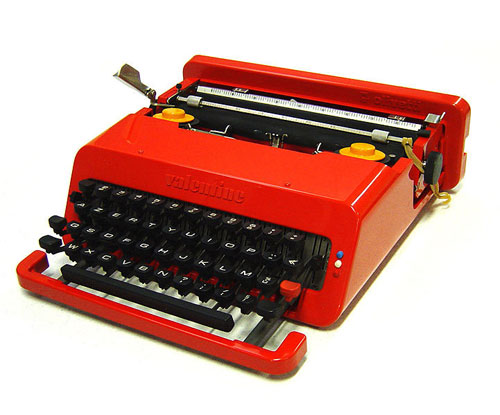 A red Olivetti Valentine Typewriter