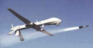 A Predator UAV launches a Hellfire missile
