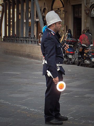 Italian policeman with "lollipop"